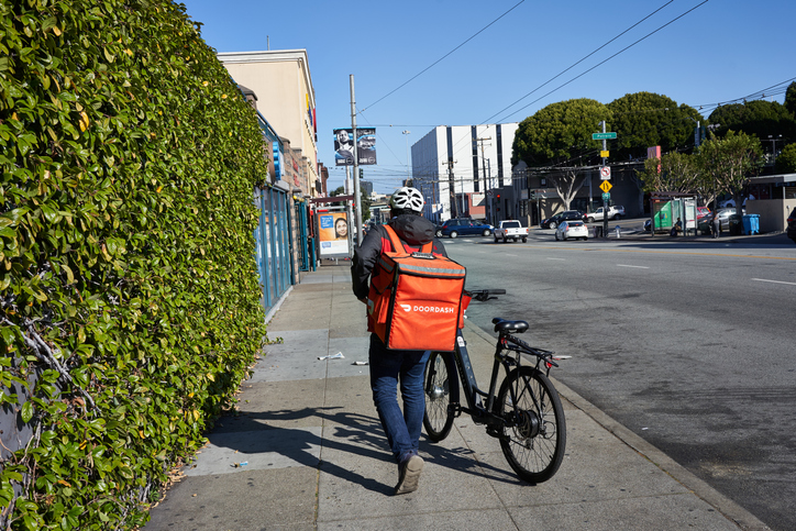 DoorDash courier making a delivery - DoorDash’s Social Engineering Breach